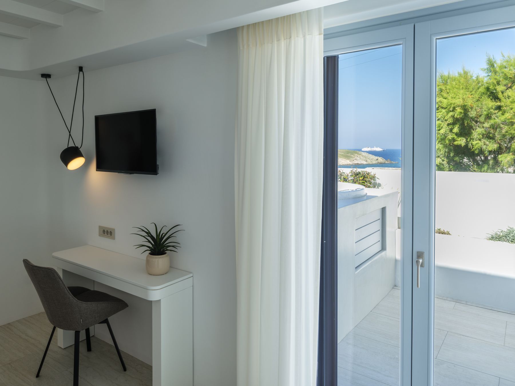 Suite 1 desk and balcony doors