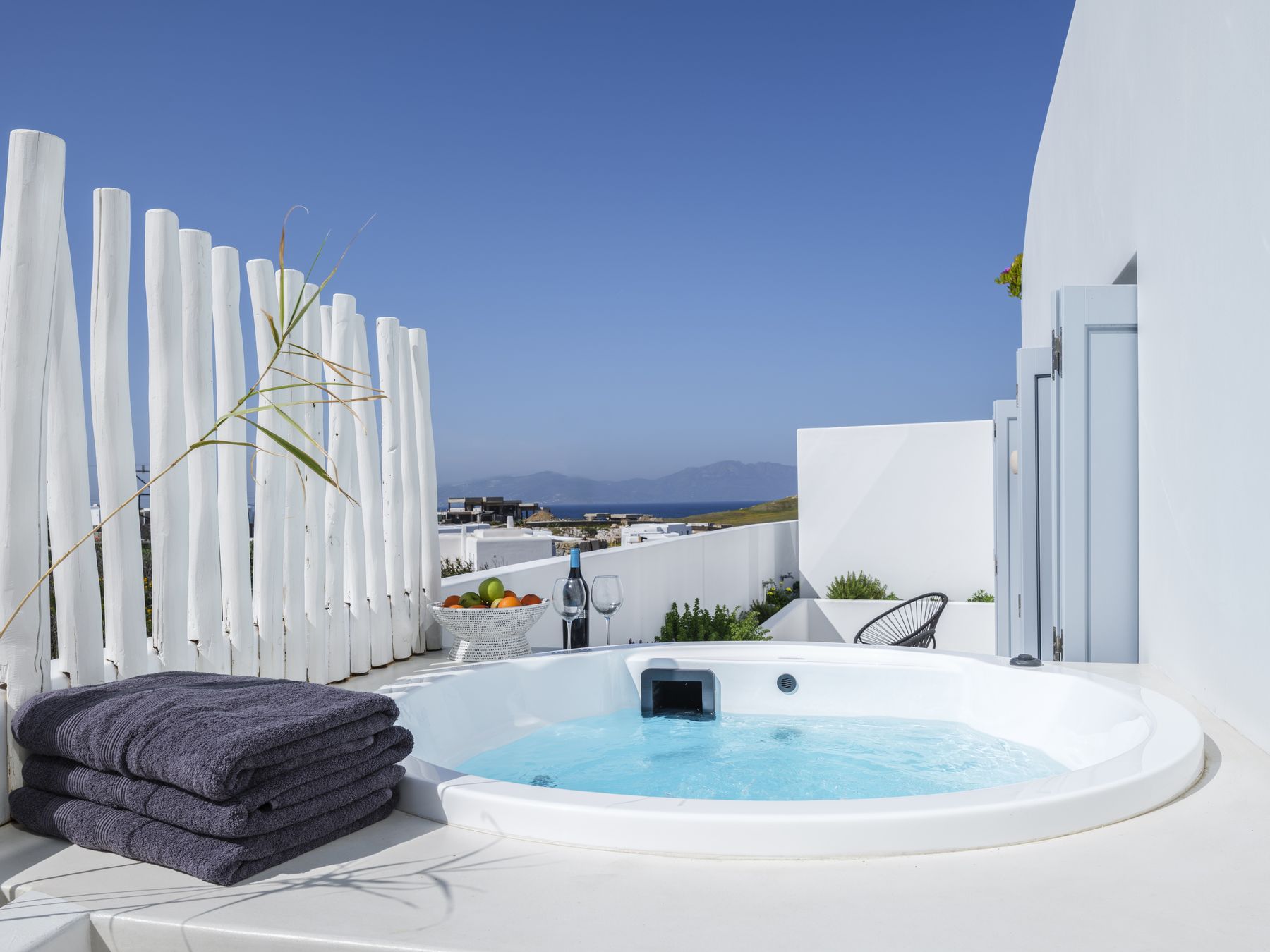 Suite 3 private jacuzzi on a white terrace